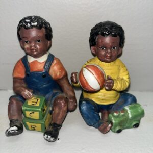 African Americans Boys Playing With Toys Figurines